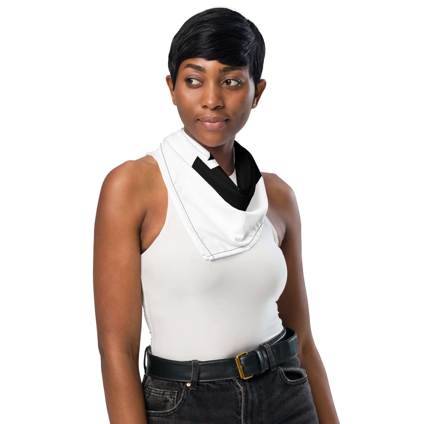 Person wearing stylish Bandana N°1 as a neck accessory, adding flair to a casual outfit. Versatile fashion piece in white and black.