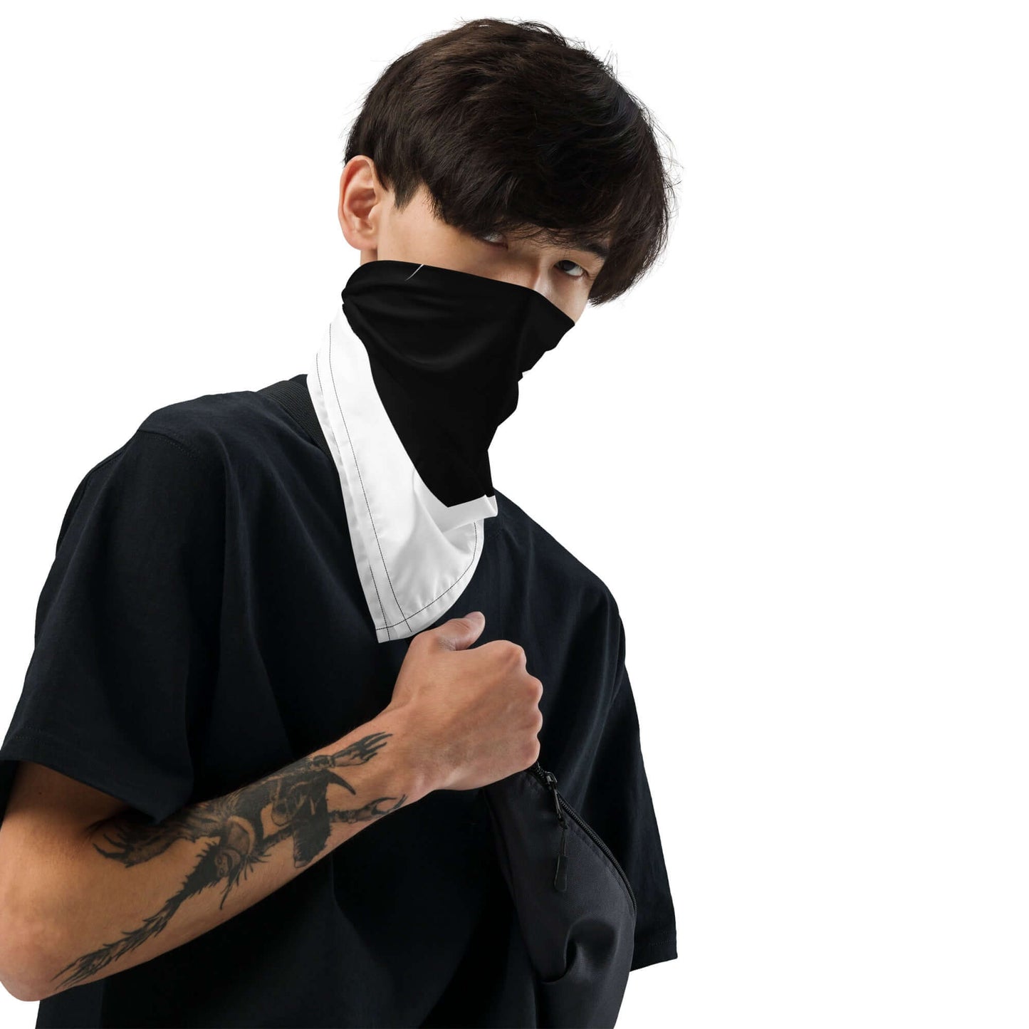 Person wearing Bandana N°1 styled as face covering with black and white design.