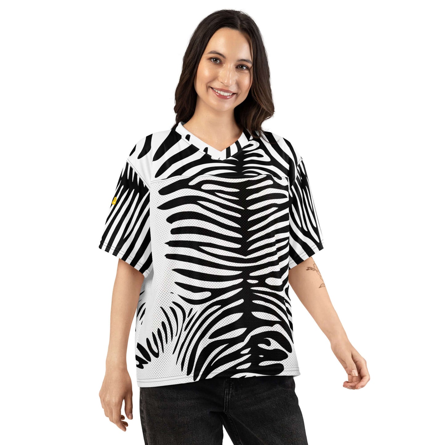 Woman wearing a Weit geschnittenes Football-Trikot with zebra pattern, made of silky stretch top and breathable mesh bottom.