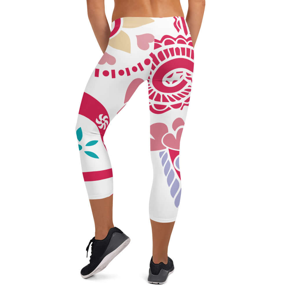 Woman wearing colorful patterned Capri-Leggings N°4, showcasing the soft and comfortable fabric with UV protection.