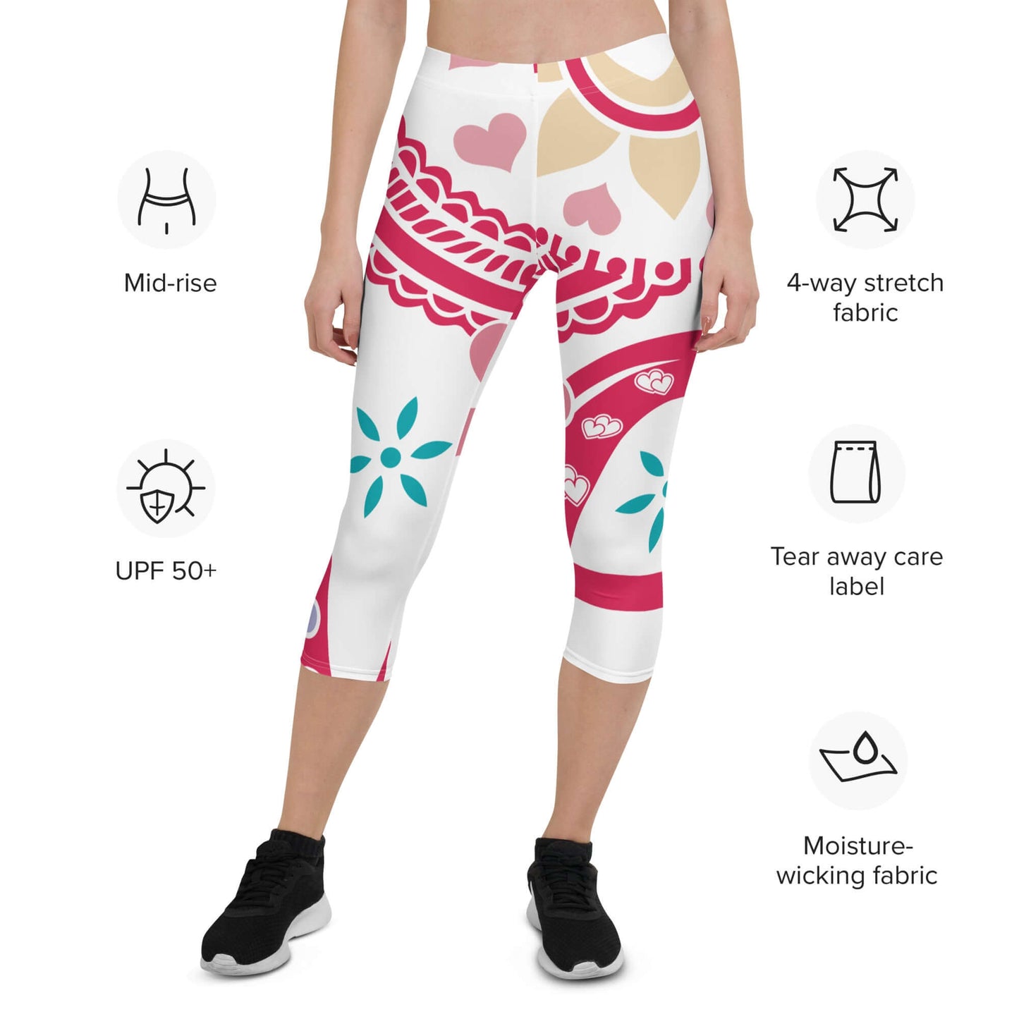 Model wearing colorful Capri-Leggings N°4 with 4-way stretch, UPF 50+, mid-rise, tear-away label, and moisture-wicking fabric features.