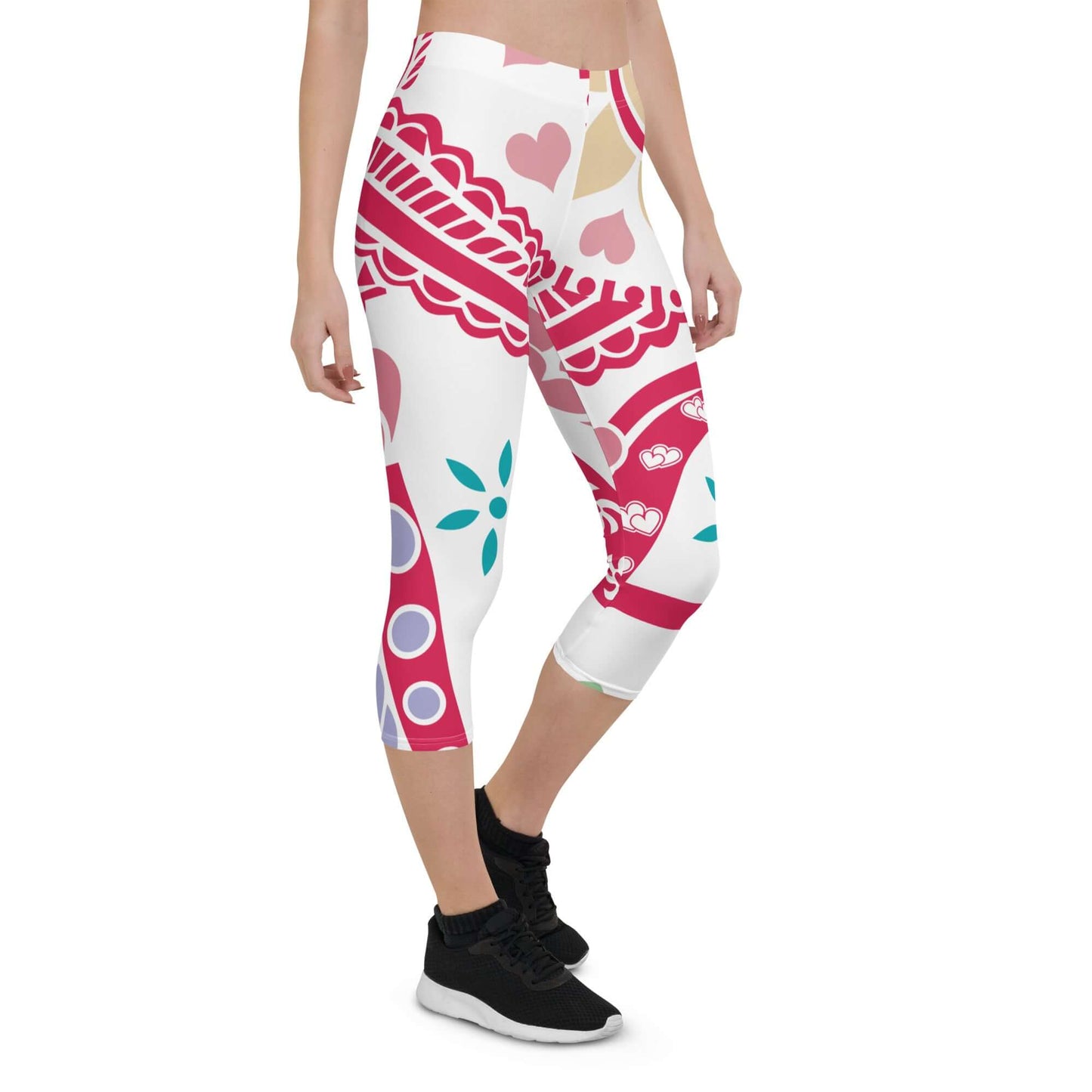 Model wearing colorful Capri-Leggings N°4 with abstract pattern, showing four-way stretch and comfort fabric.