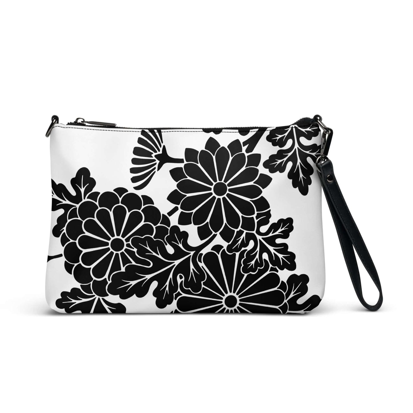 Stylish Umhängetasche N°1 with floral pattern in black and white, equipped with detachable wrist and shoulder strap.