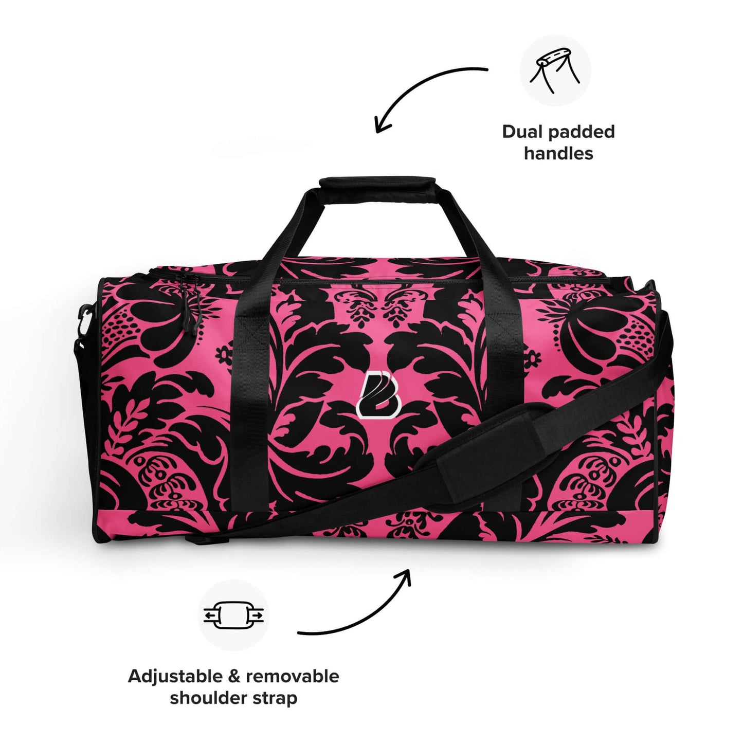 Weekender N°29 in pink with black floral pattern, featuring adjustable shoulder strap and dual padded handles for travel.