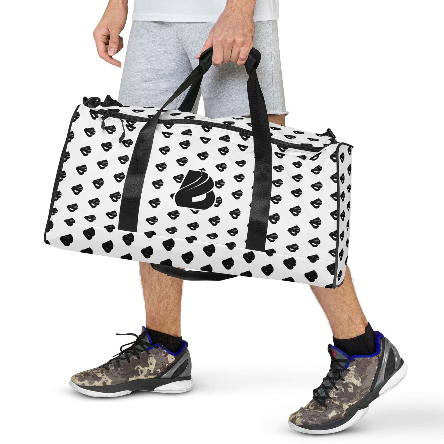 Man holding a patterned duffel bag called Weekender N°30, ideal for travel, daily errands, or gym use with multiple compartments and adjustable straps.