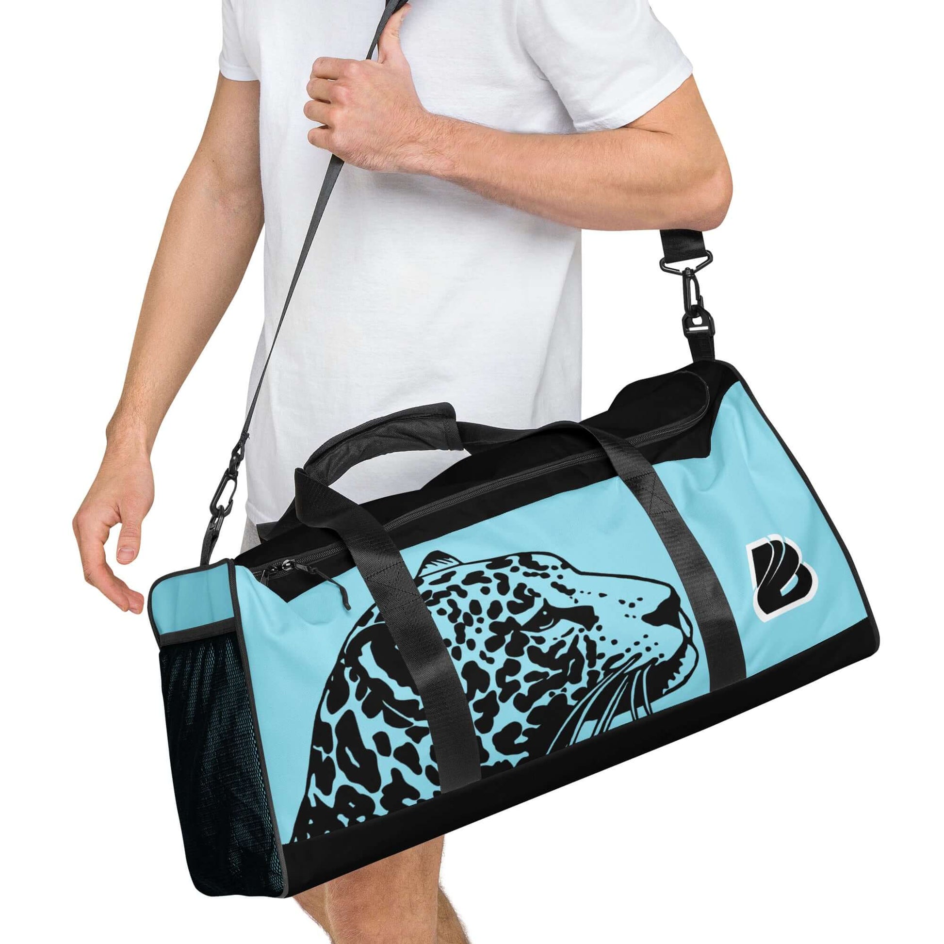 Alt Tag: Person carrying Weekender N°27 bag with jaguar print design, featuring adjustable padded shoulder straps for comfort.