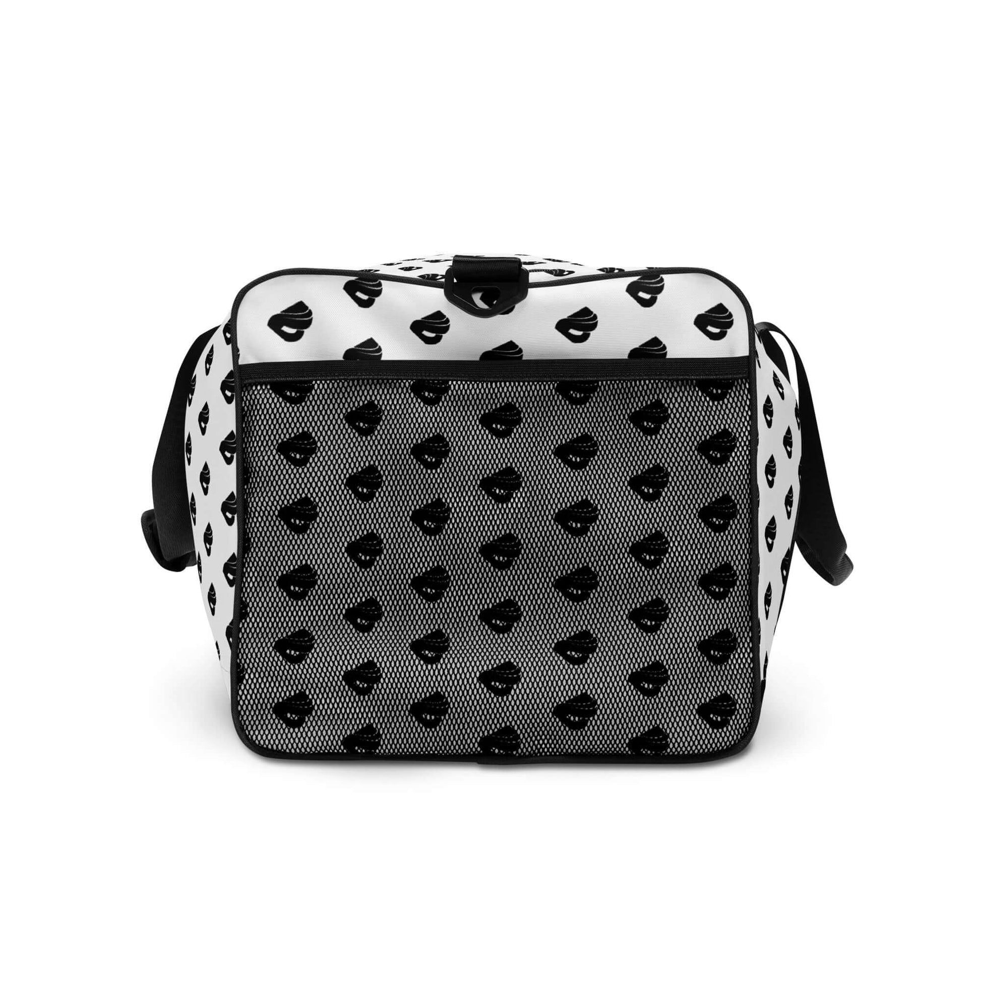 Weekender N°30 stylish travel bag with black and white design, perfect for journeys and daily errands, featuring adjustable shoulder straps.