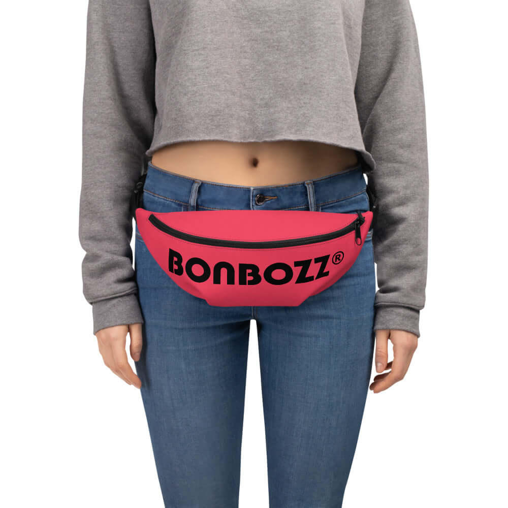 Person wearing Gürteltasche N°29, a stylish red fanny pack, ideal for festivals and travel with adjustable strap and inner pocket.
