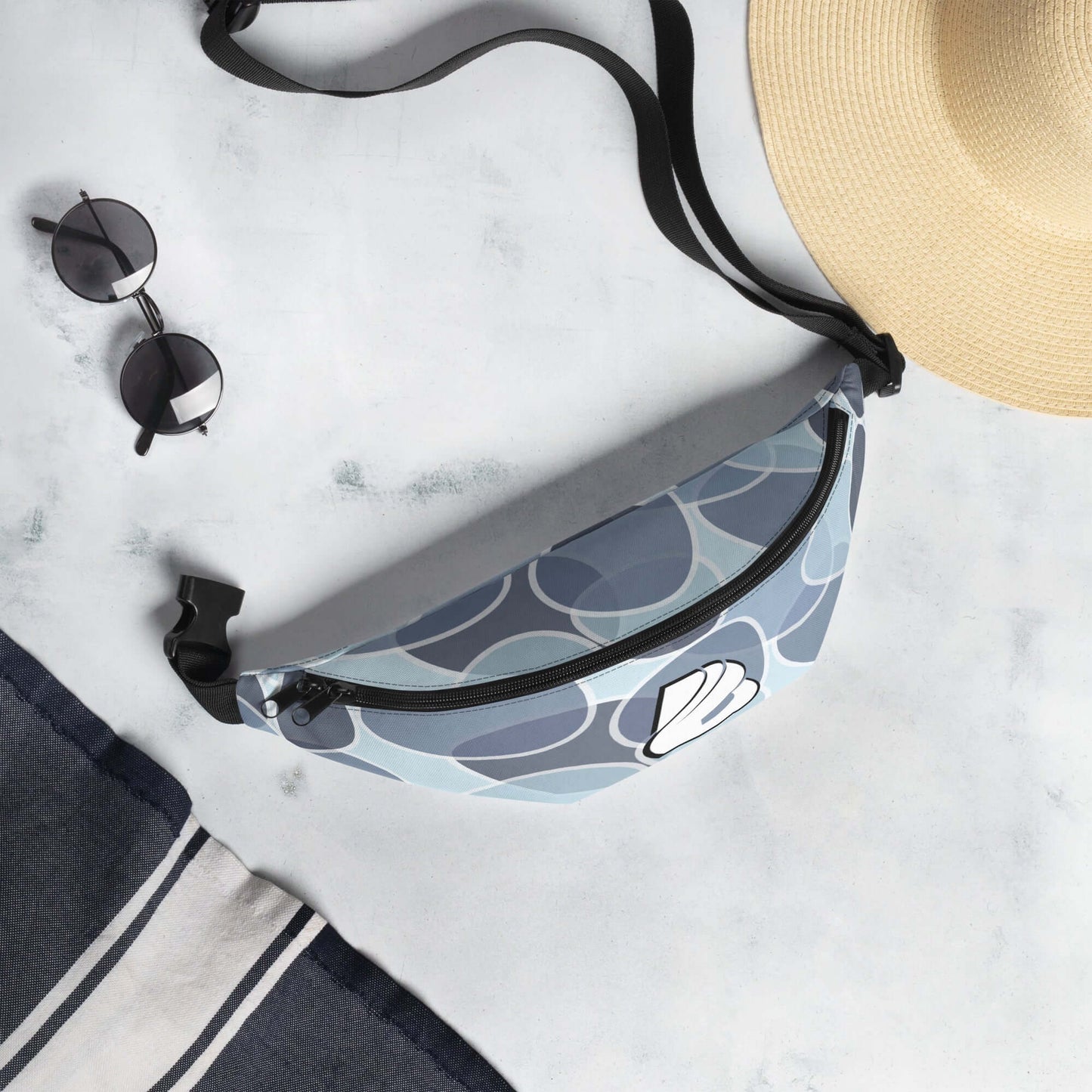 Stylish Gürteltasche N°31 with adjustable strap, ideal for festivals and travel, shown with sunglasses and summer hat.