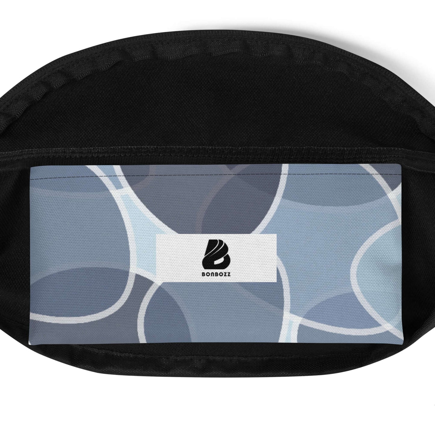 Interior view of Gürteltasche N°31 showing the adjustable strap and inner pocket with a stylish blue pattern for versatile use.
