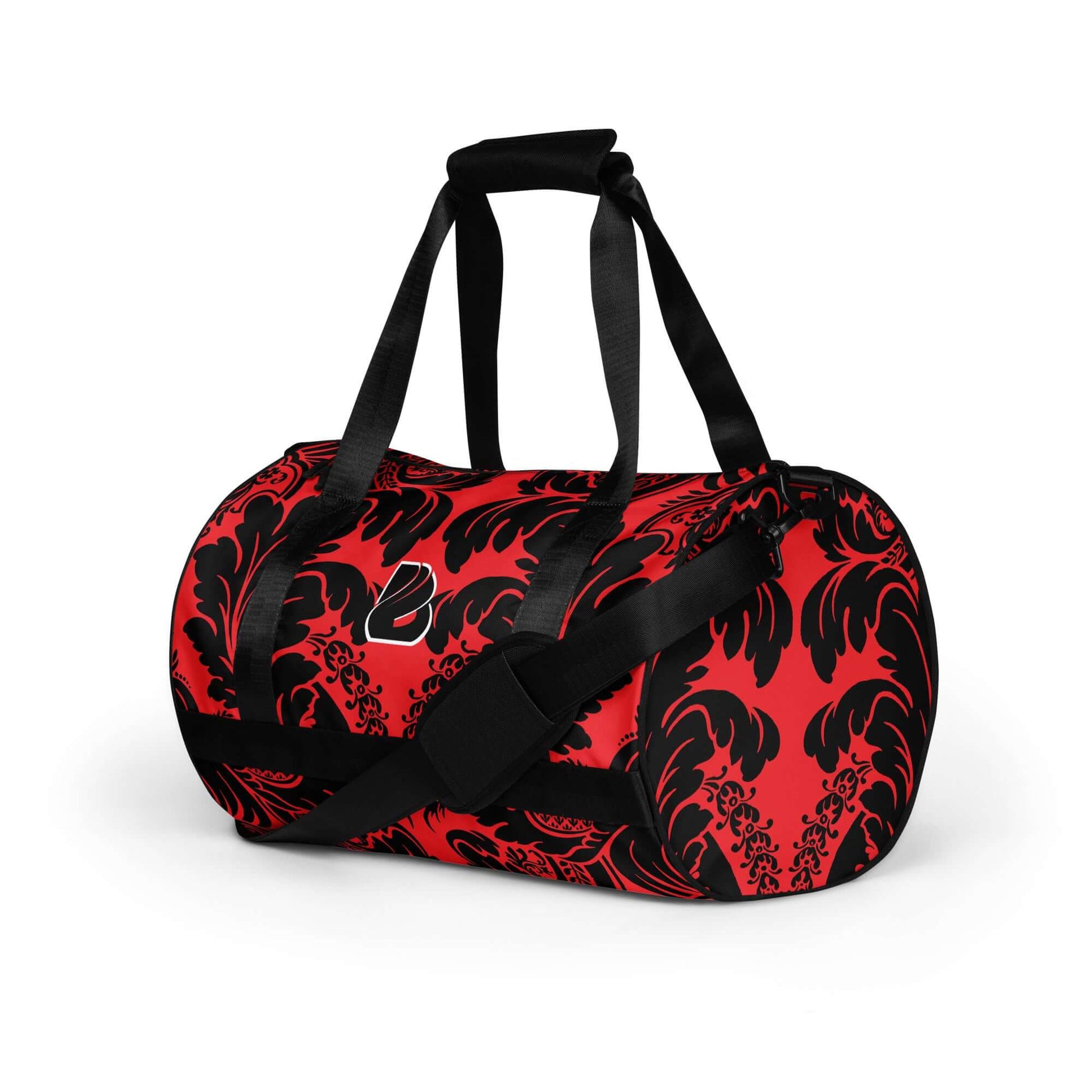 Vibrant Allover-Print-Sporttasche N°5 with a red and black pattern, ideal for fitness enthusiasts, made of waterproof polyester.