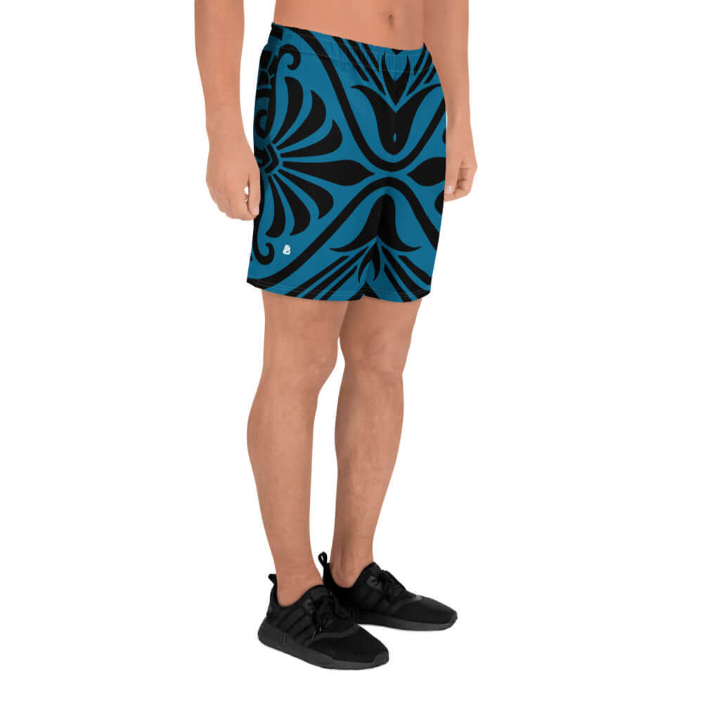 Man wearing Recycelte Sport-Shorts für Herren N°2 in blue and black design, ideal for fitness activities.