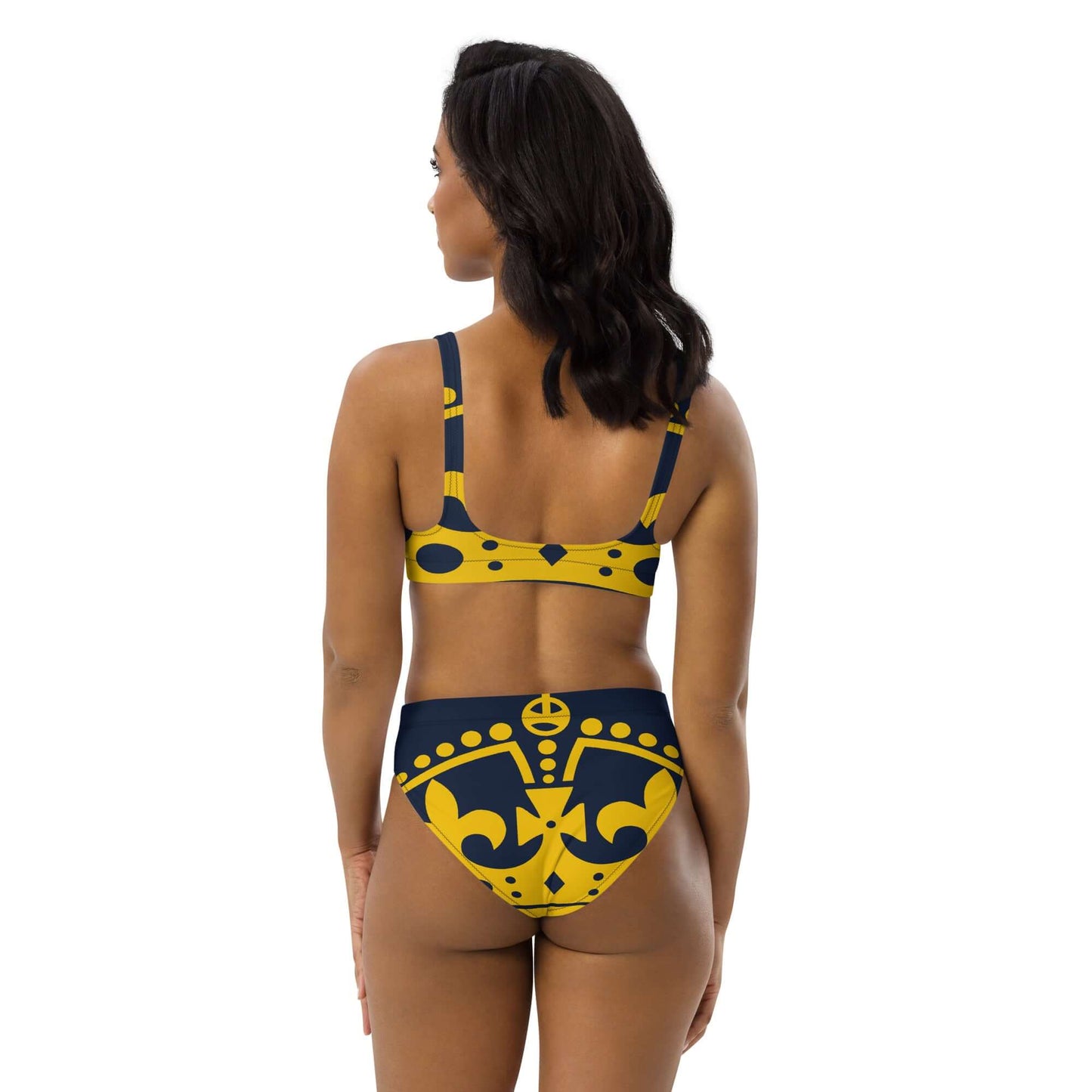 Woman wearing Recycelter Allover High Waist Bikini N°1, stylish and eco-friendly design, back view showing colorful pattern.