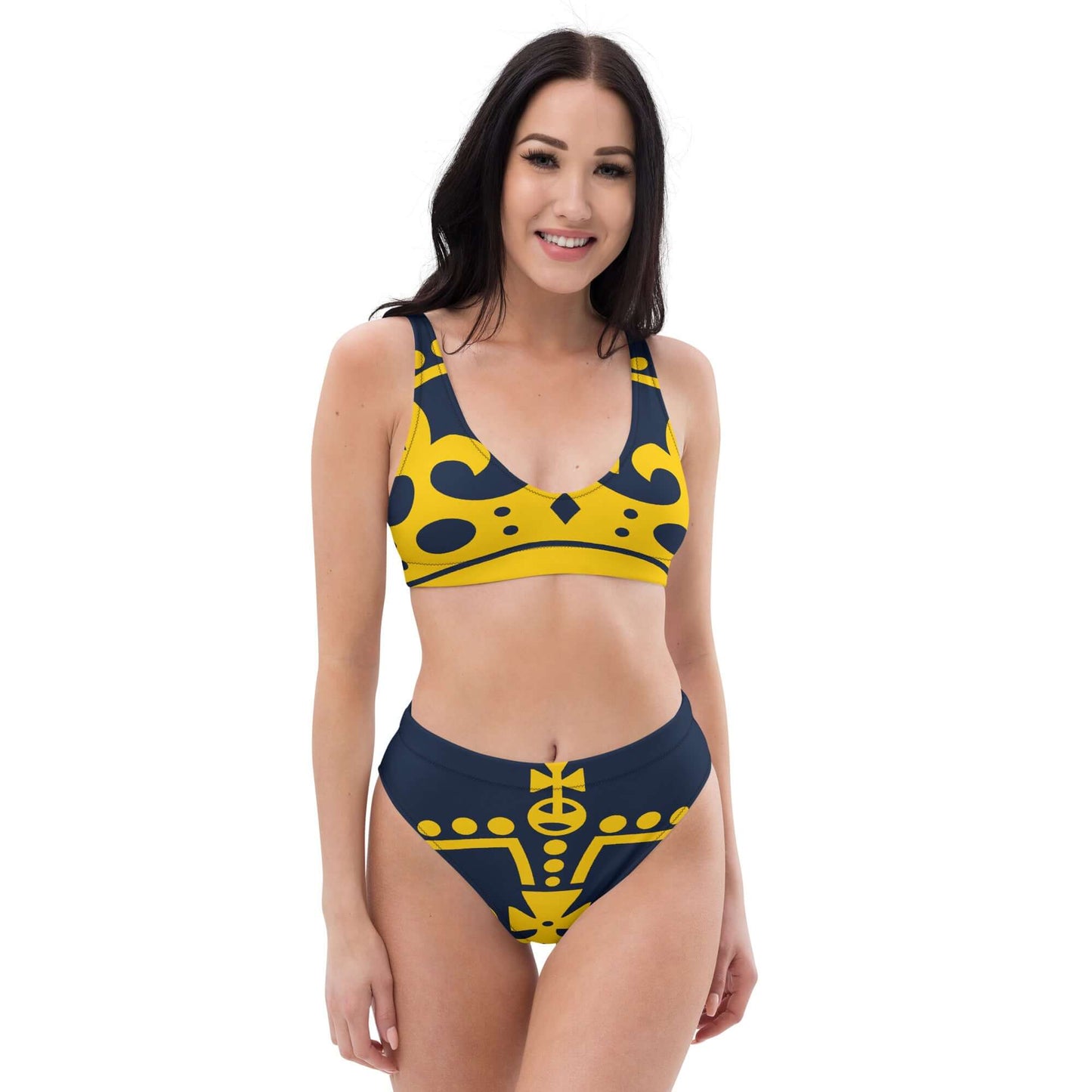 Woman wearing Recycelter Allover High Waist Bikini N°1 with vibrant pattern, showcasing eco-friendly swimwear design.