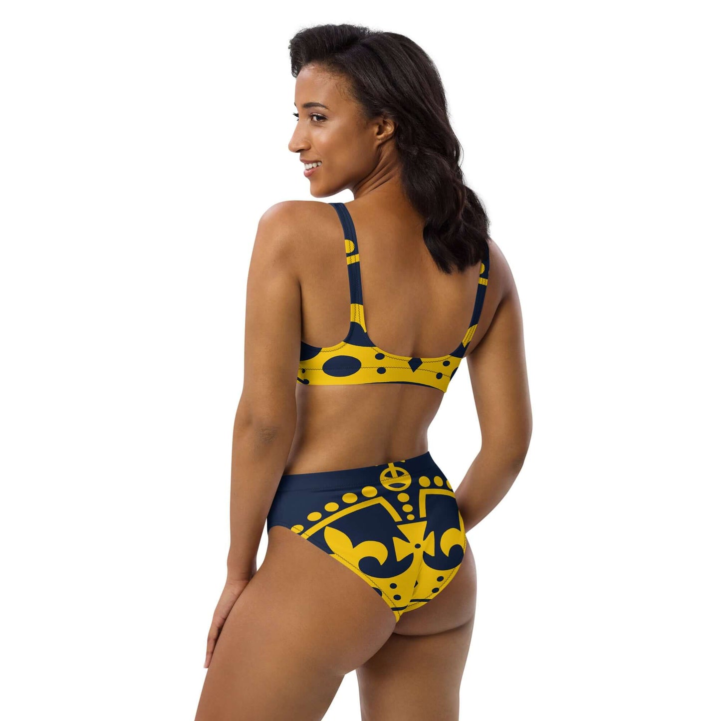 Woman wearing Recycelter Allover High Waist Bikini N°1 with colorful pattern.