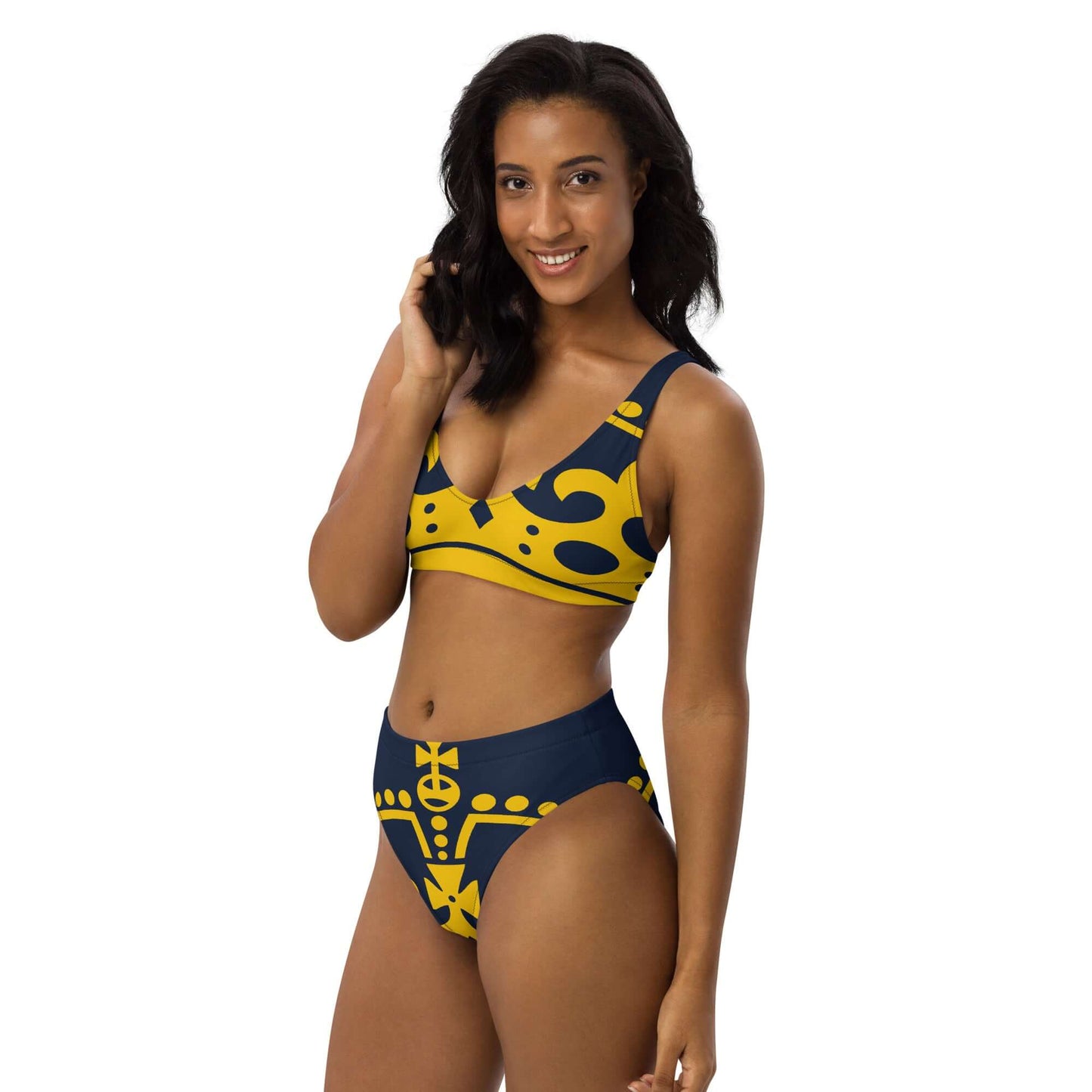 Model wearing Recycelter Allover High Waist Bikini N°1 in yellow and blue with high waist design.