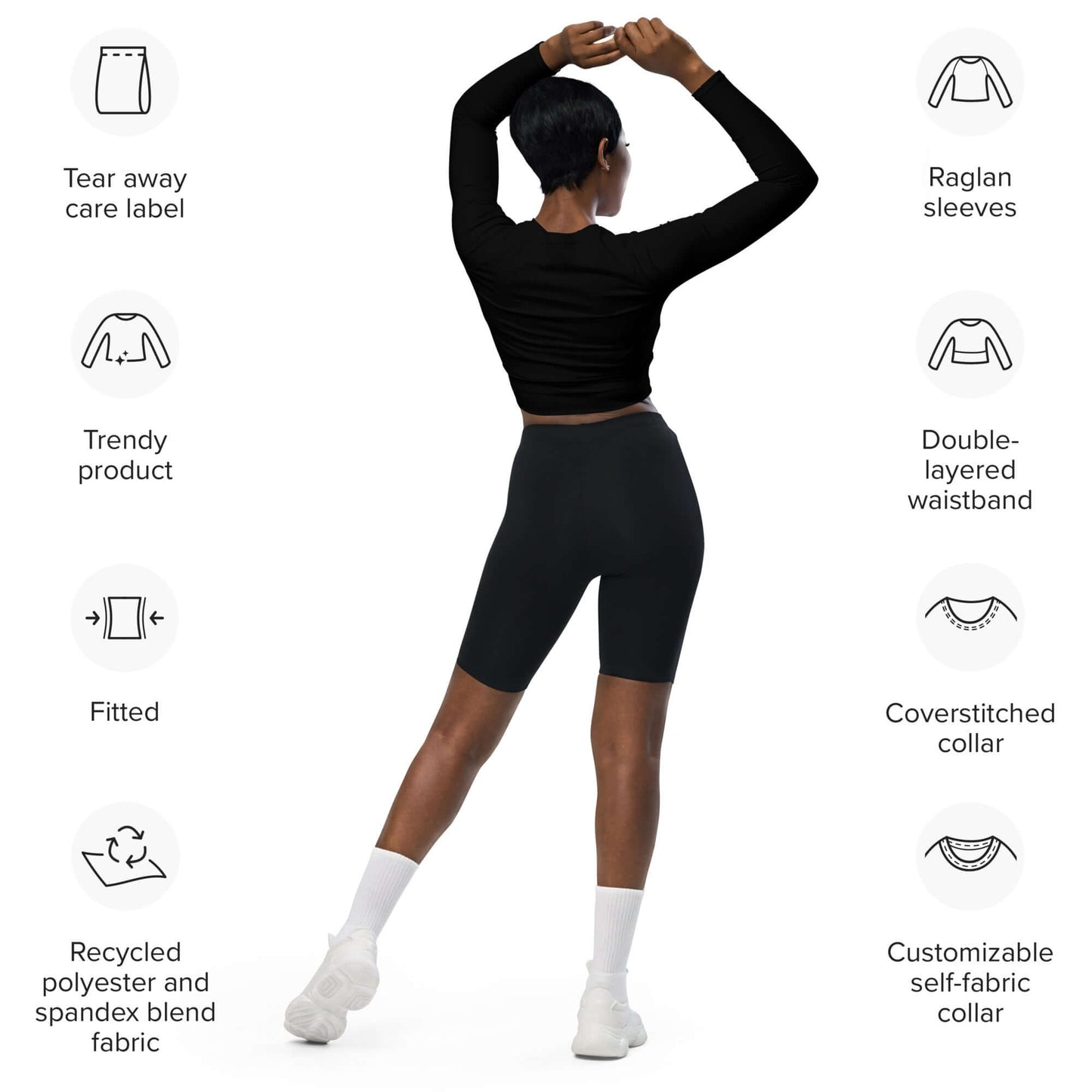 Woman modeling Recyceltes Langarm Crop Top mit Allover-Druck N°3 with features: tear away label, raglan sleeves, eco-friendly materials.