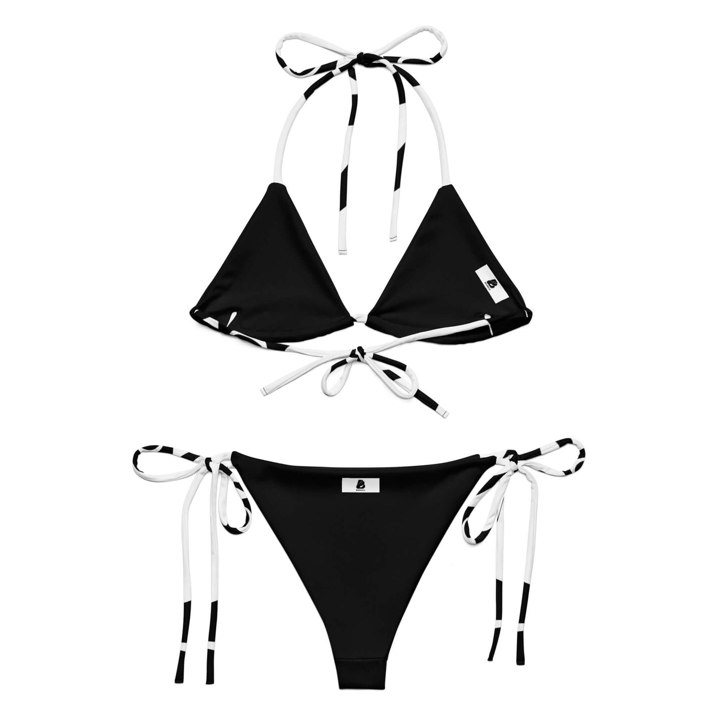 Recycelter Schnürbikini N°0 in Schwarz mit Allover-Druck, flexibel tragbar mit UPF 50+, aus weichem recyceltem Polyester.