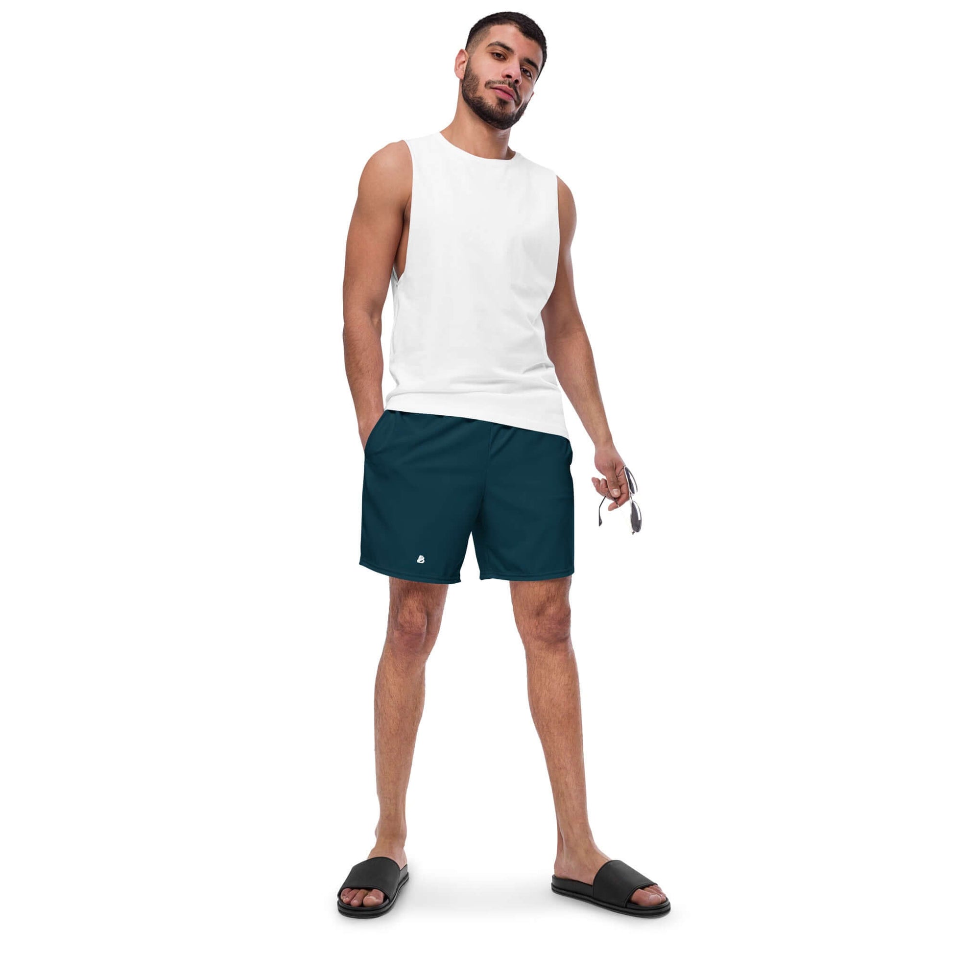 Man wearing Herren-Badehosen N°15, stylish swim trunks for summer with quick-dry, breathable fabric and multiple pockets.