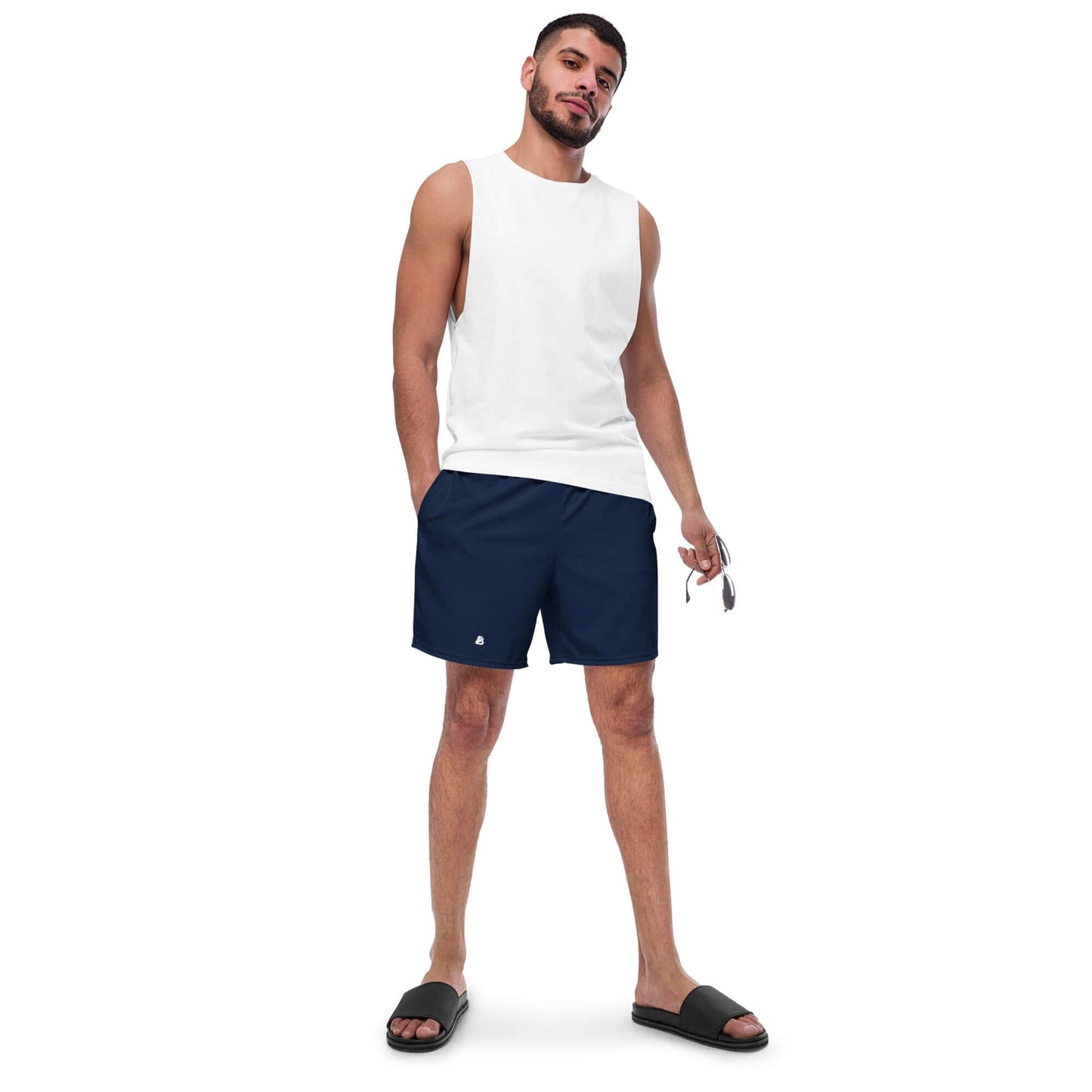 Man wearing Herren-Badehosen N°16 in navy, featuring quick-dry fabric and breathable design for summer.