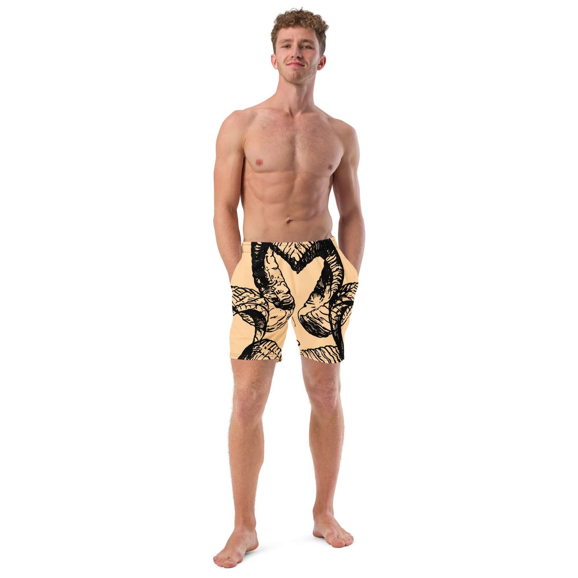 Model wearing Herren-Badehosen N°14, quick-dry, breathable swim shorts with pockets, black leaf pattern on beige background.
