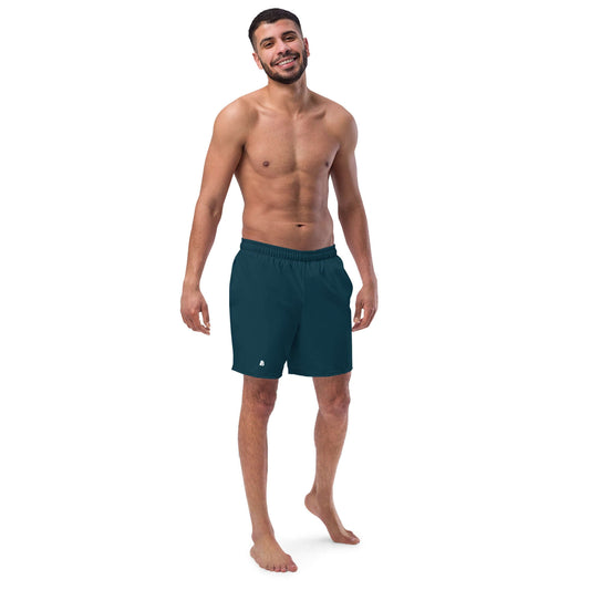 Man wearing Herren-Badehosen N°15, quick-dry swim shorts made of 91% recycled polyester, ideal for summer with pockets and silky lining.