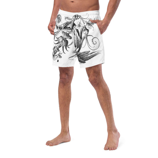 Man wearing Herren-Badehosen N°12 with artistic black and white design, showcasing quick-dry and breathable fabric for summer.
