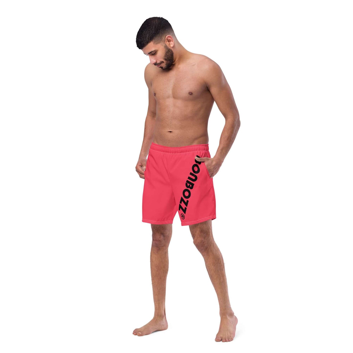 Model wearing Herren-Badehosen N°13, quick-drying red swim shorts with side pockets, perfect for summer.