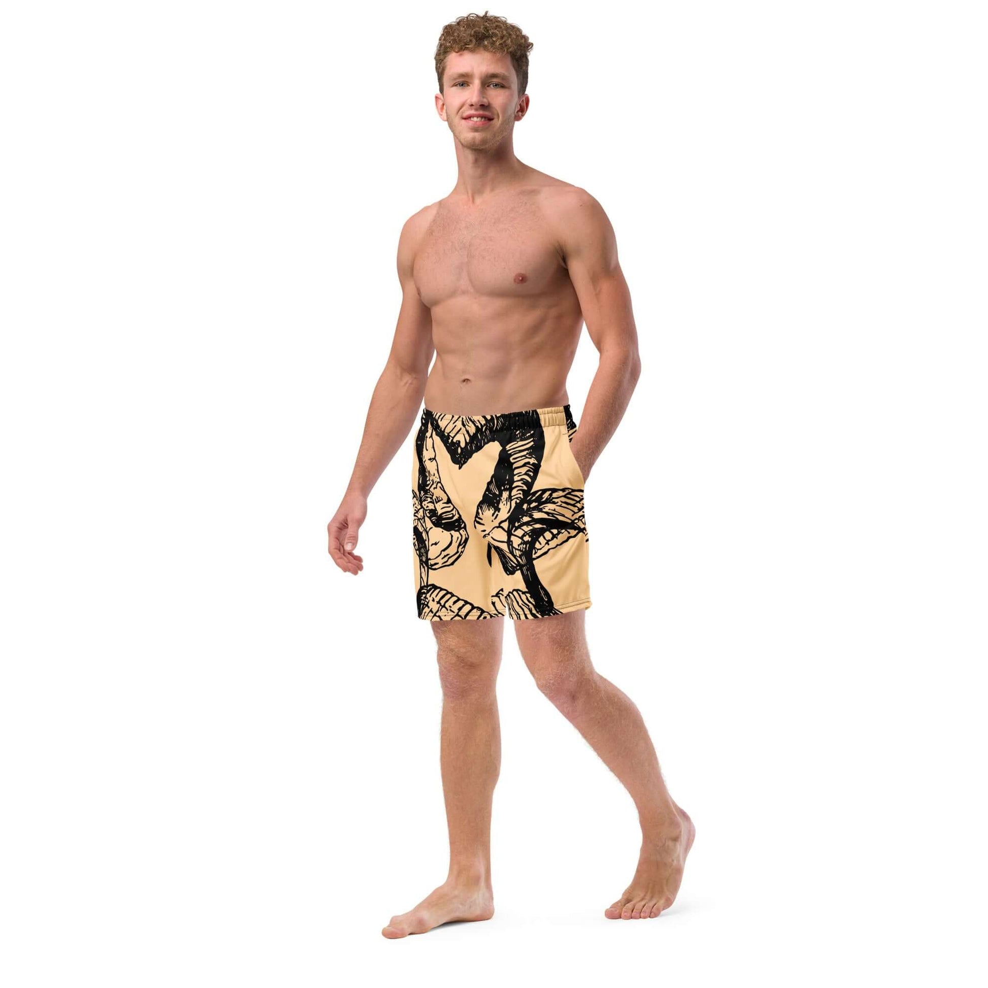 Model wearing Herren-Badehosen N°14, stylish quick-drying men's swim trunks with tropical design, ideal for summer days.