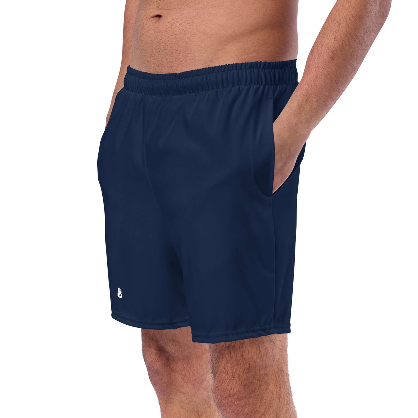 Man wearing Herren-Badehosen N°16 in navy blue with quick-dry, breathable fabric and side pockets, ideal for summer.