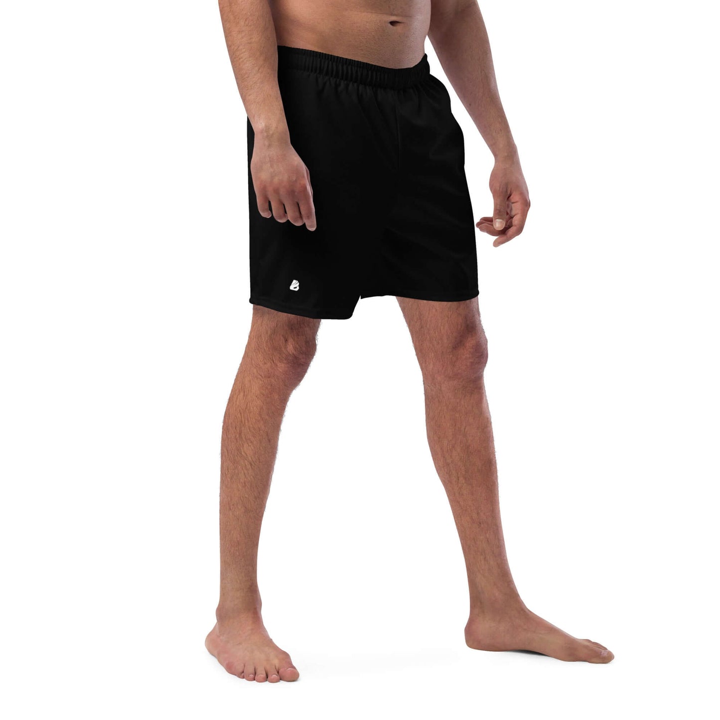 Man wearing Herren-Badehosen N°11, black swim shorts with quick-dry, breathable fabric, multiple pockets, and anti-chafe lining.