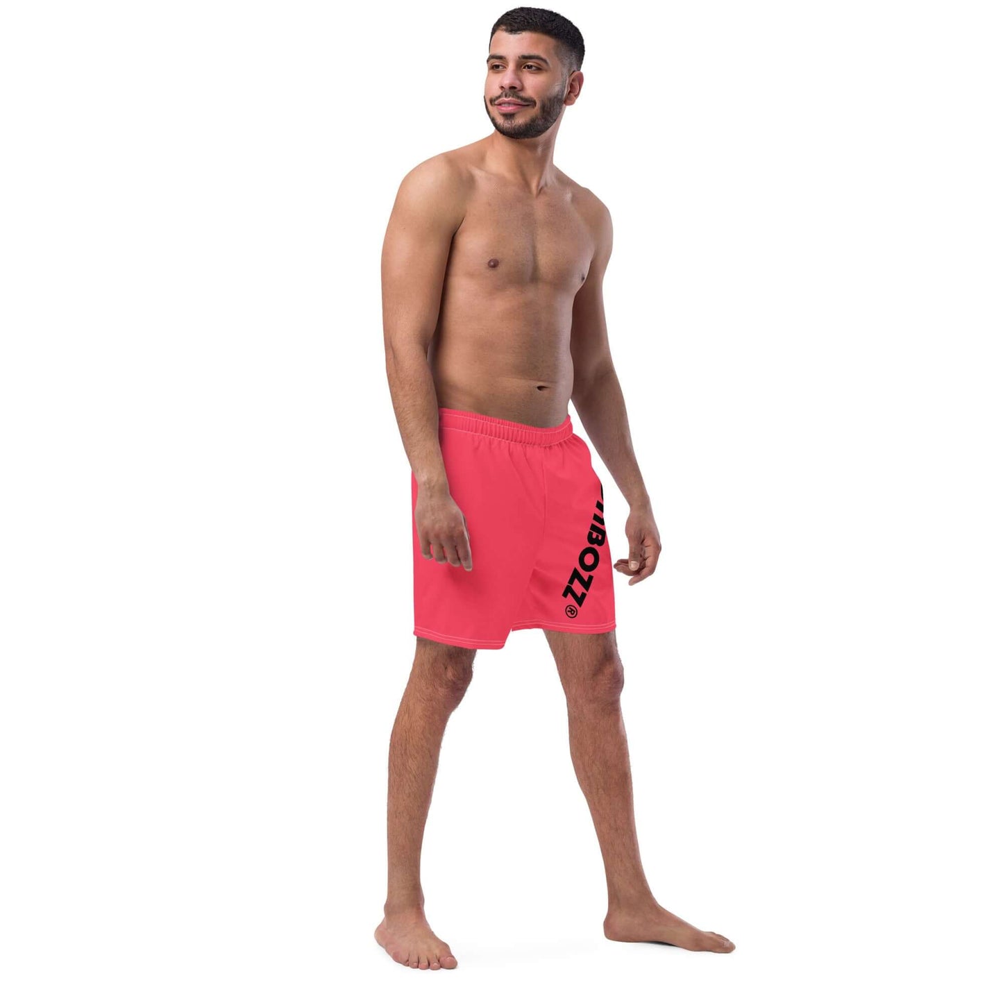 Man wearing Herren-Badehosen N°13 in pink color, showcasing quick-drying and breathable swim shorts for summer.