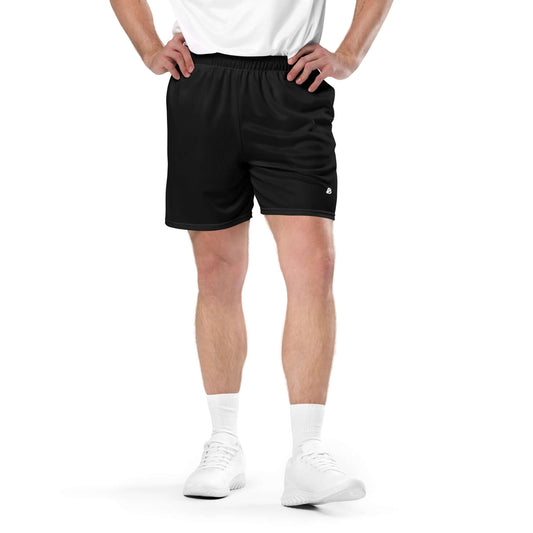 Model wearing Unisex Mesh-Shorts N°0 in black, showcasing flexibility and comfort, made from 100% recycled polyester.