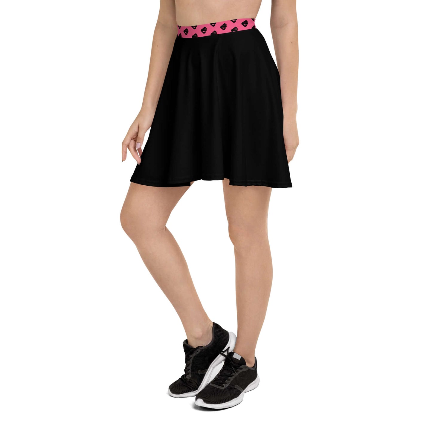 Model wearing Skater-Rock N°10, soft flared black skirt with pink waistband, flattering silhouette, comfortable fit, suitable for all body types.