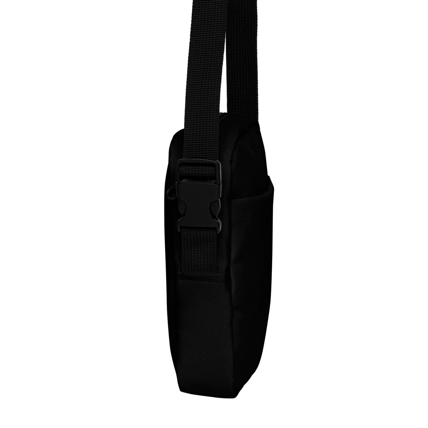 Side view of black Nützliche Umhängetasche N°0 with adjustable straps and durable polyester fabric.