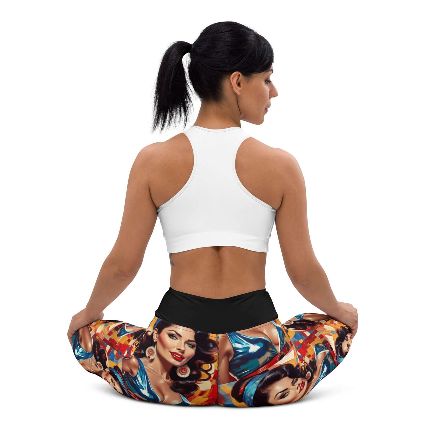 Woman wearing Yoga-Leggings N°48 with vibrant design, seated in meditation pose, showcasing soft, stretchy fabric and high waistband.