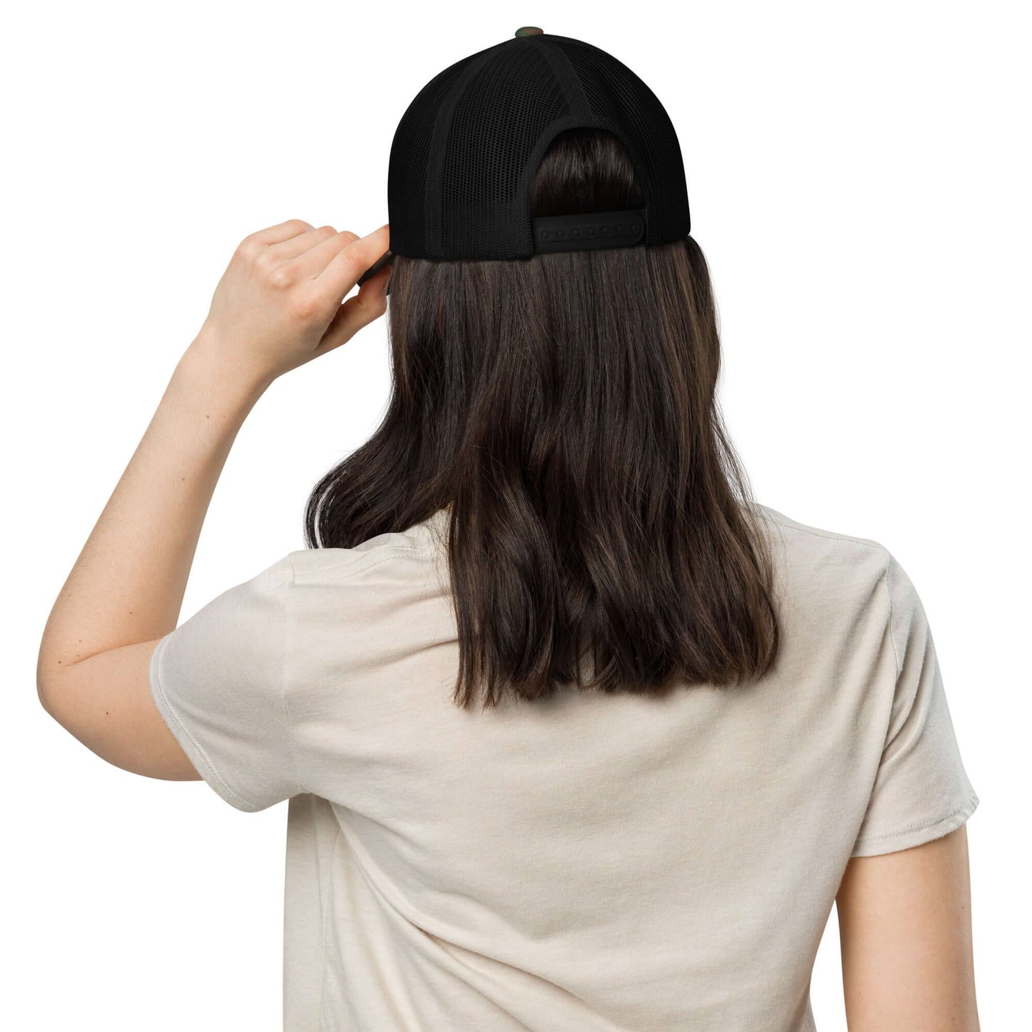 Rear view of person wearing a Trucker-Hat im Camouflage-Look N°0 with mesh back and adjustable snap closure, ideal for outdoor activities.