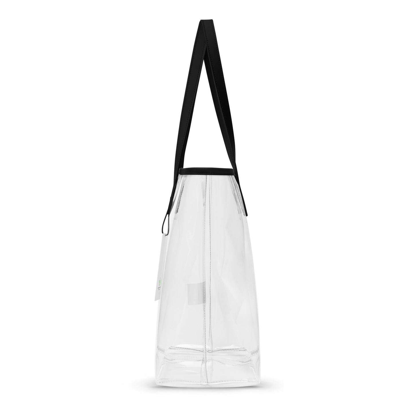 Side view of a transparent tote bag with black handles, versatile for concerts and beach days, made from durable TPU material.