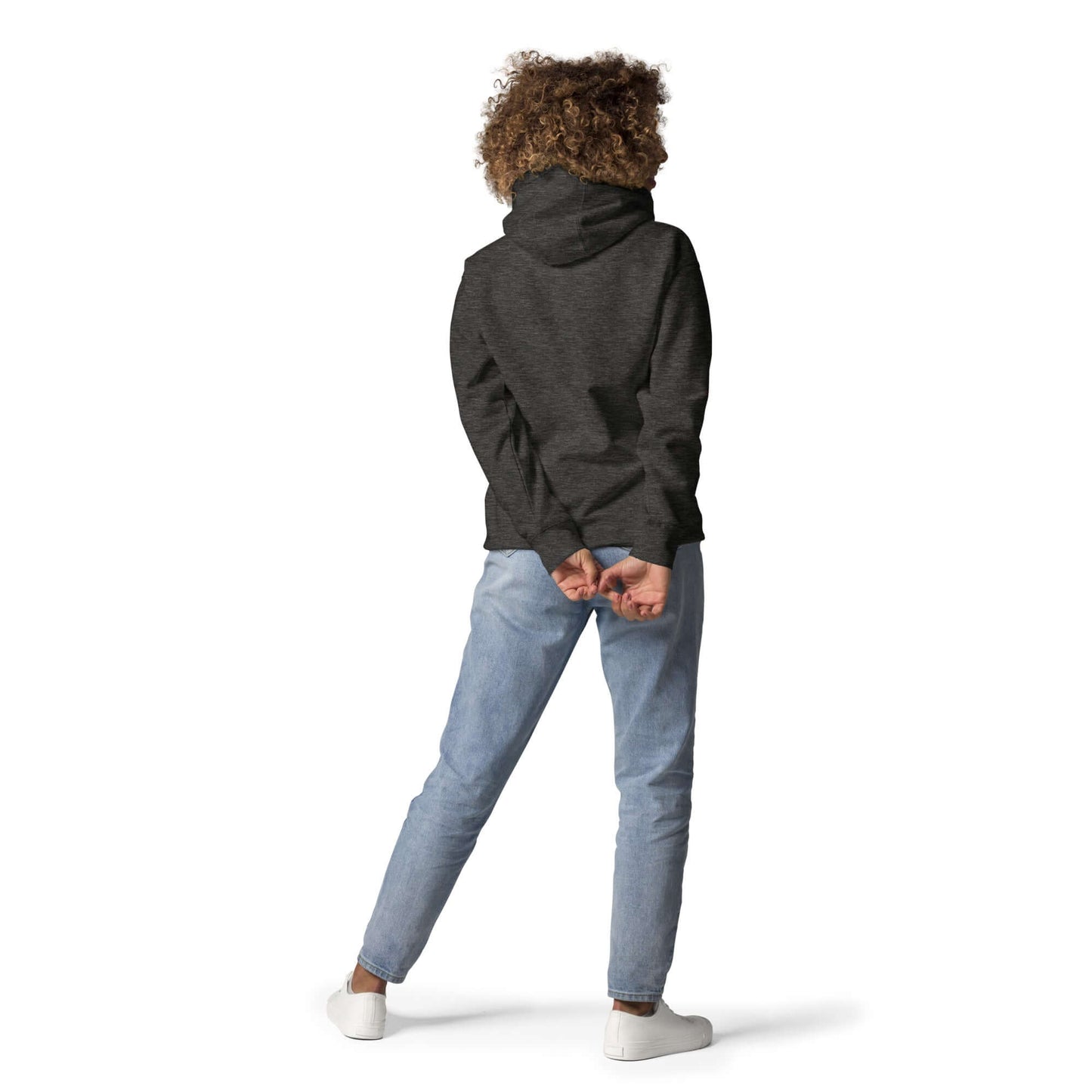 Person wearing Unisex-Kapuzenpullover with practical pocket, showcasing casual streetwear style. Back view.