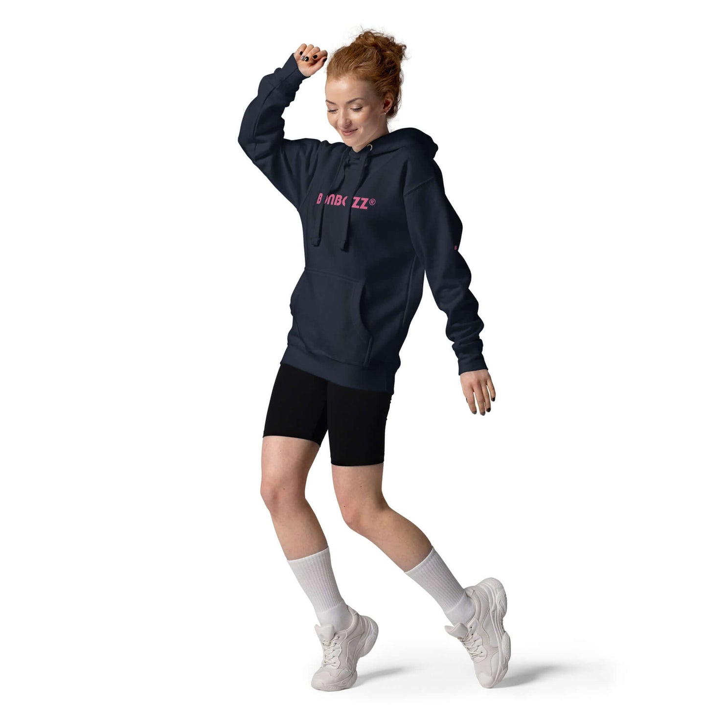 Person wearing Unisex-Kapuzenpullover with front pocket, dancing. Hoodie in cotton blend, perfect for cool evenings.