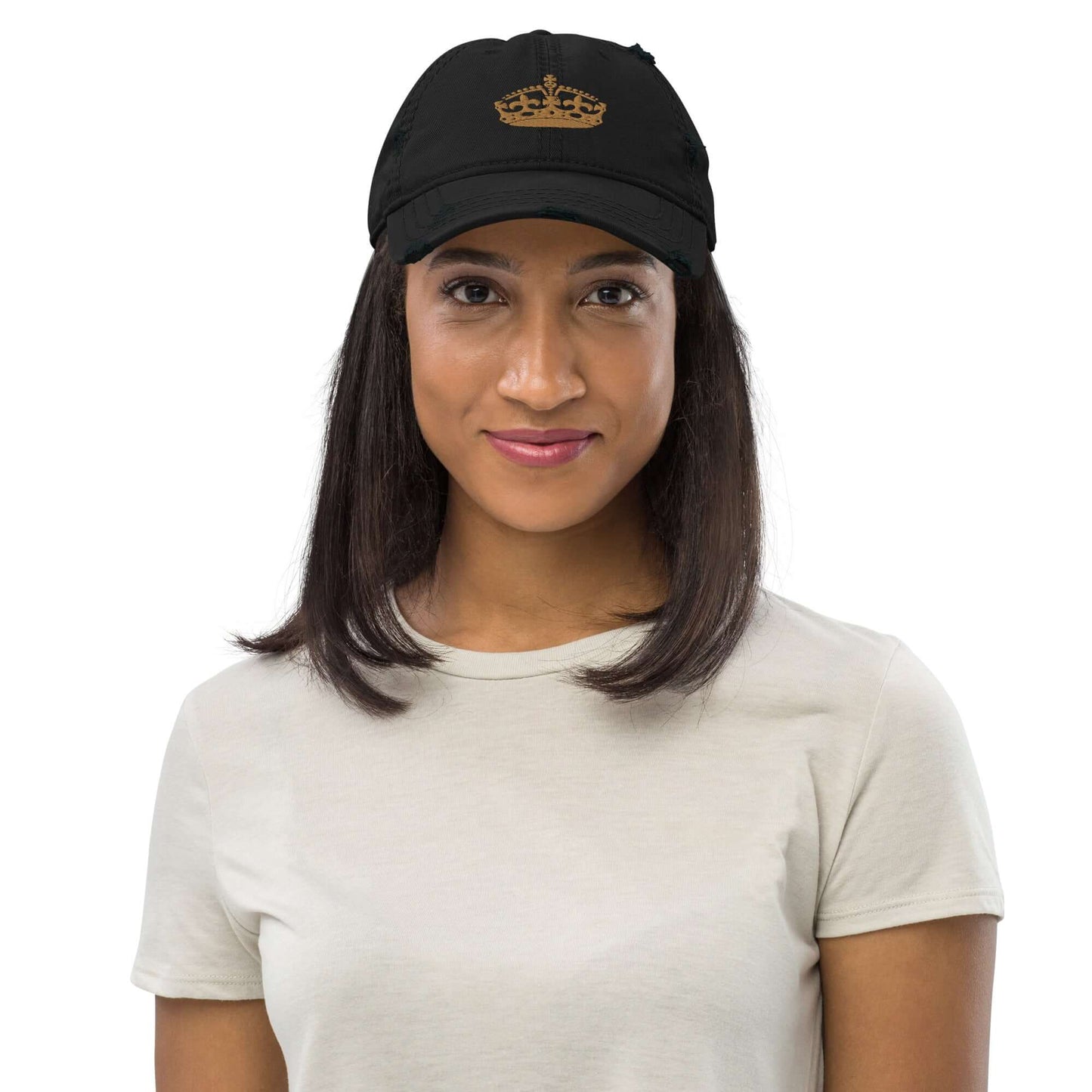 Woman wearing Dad-Hat im Used-Look N°0, black with crown embroidery, casual outfit, showcasing stylish design and soft cotton material.