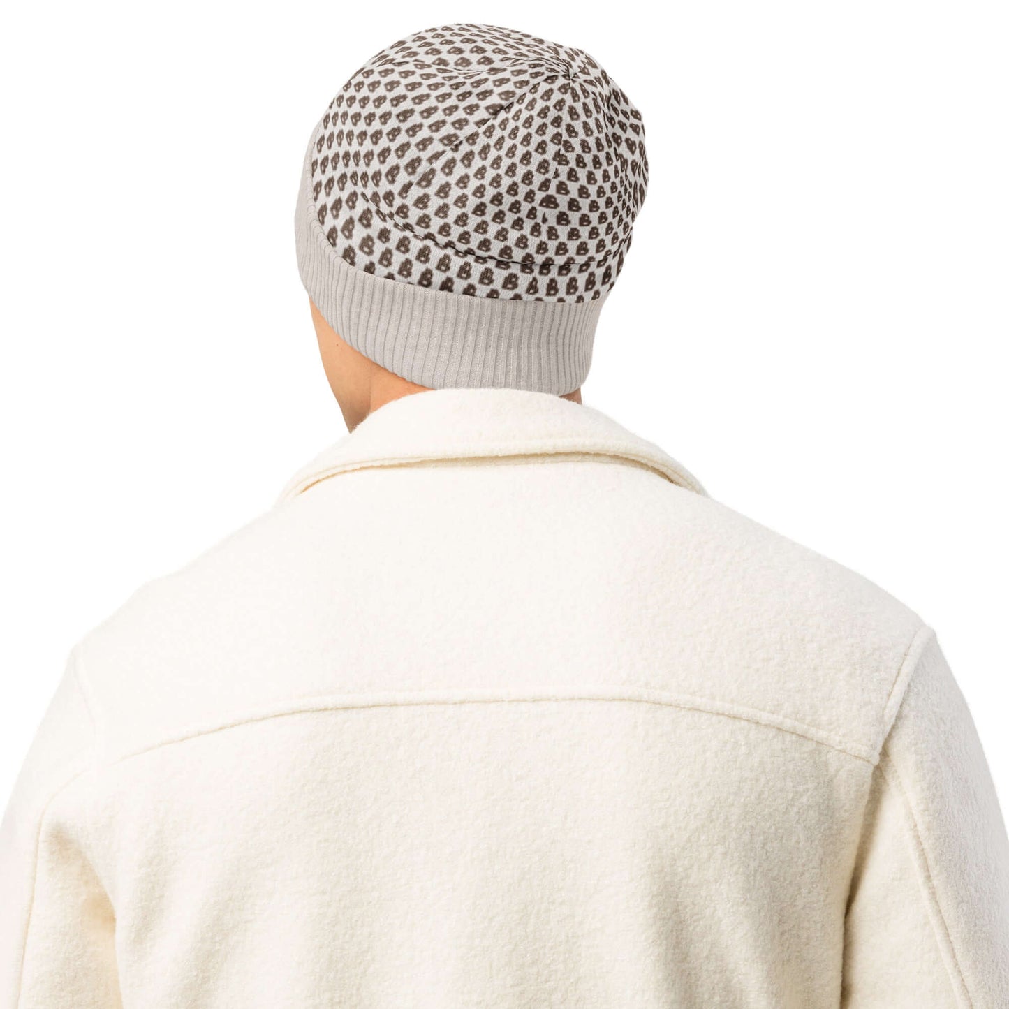Person wearing Gestrickte Mütze, a soft, lightweight knit hat suitable for everyday use, shown from the back in a neutral setting.