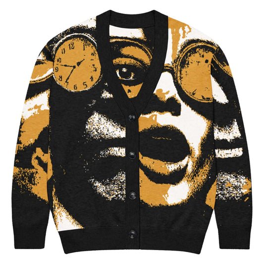 Gestrickter Cardigan with clock and glasses graphic design in black, white, and gold colors, featuring buttons and long sleeves.
