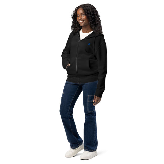 Woman wearing Premium-Zip-Hoodie in black, ideal for layering, showcasing soft and versatile design for everyday comfort.