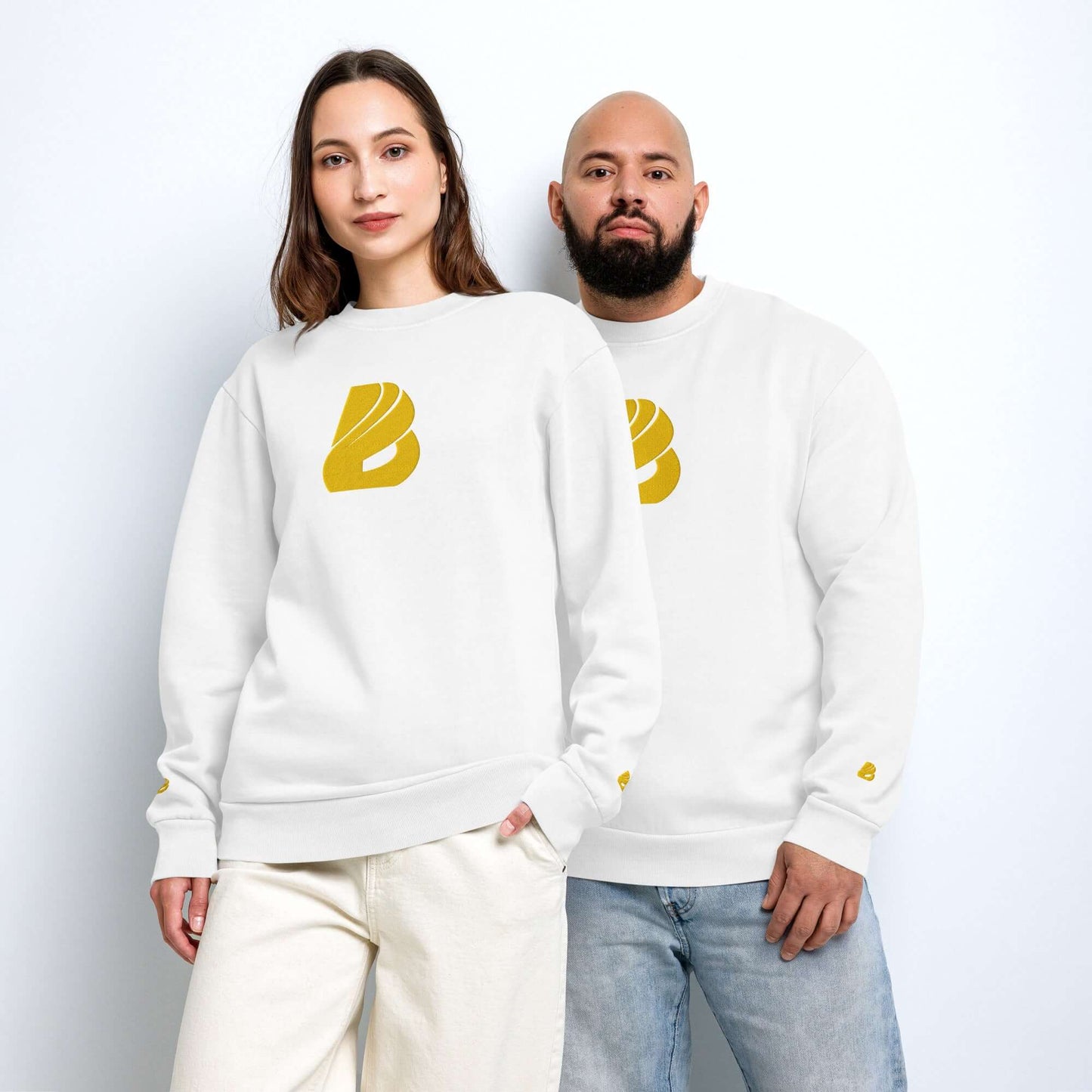 Urbaner Pullover with oversized fit in white worn by two models.