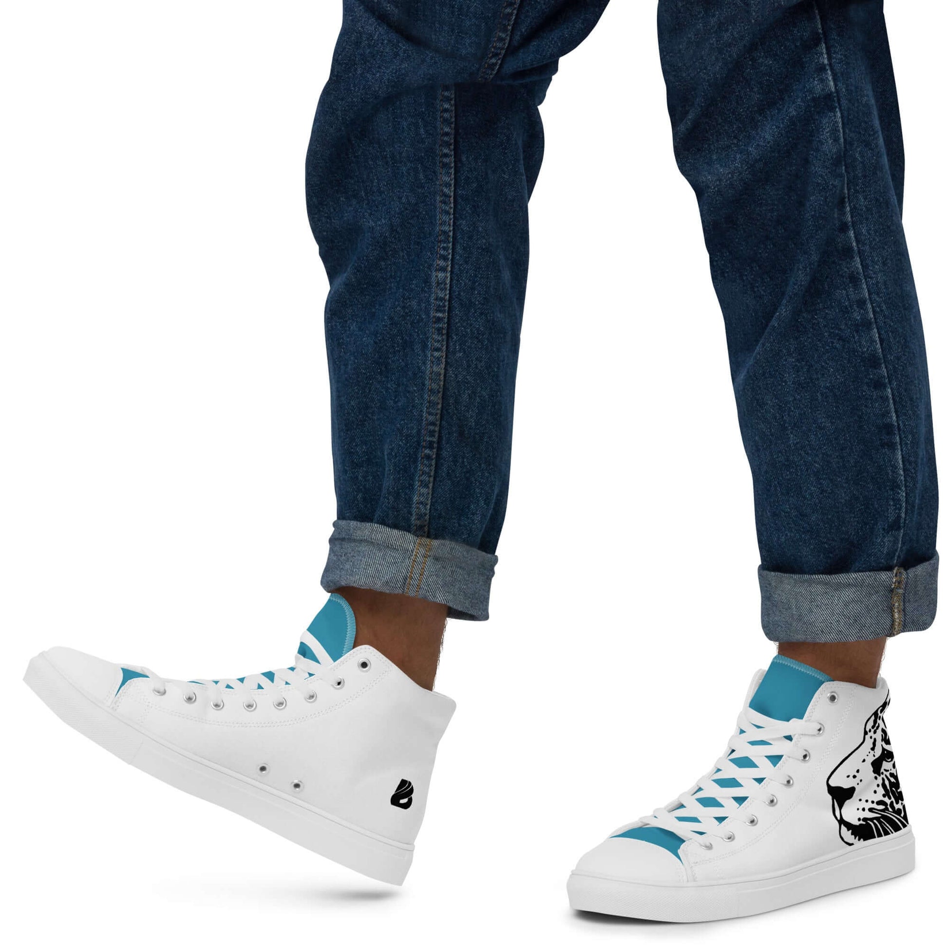 Person wearing High-Top Leinenschuhe für Herren N°5 with jean cuffs, showcasing stylish white sneakers with blue accents and graphic design.