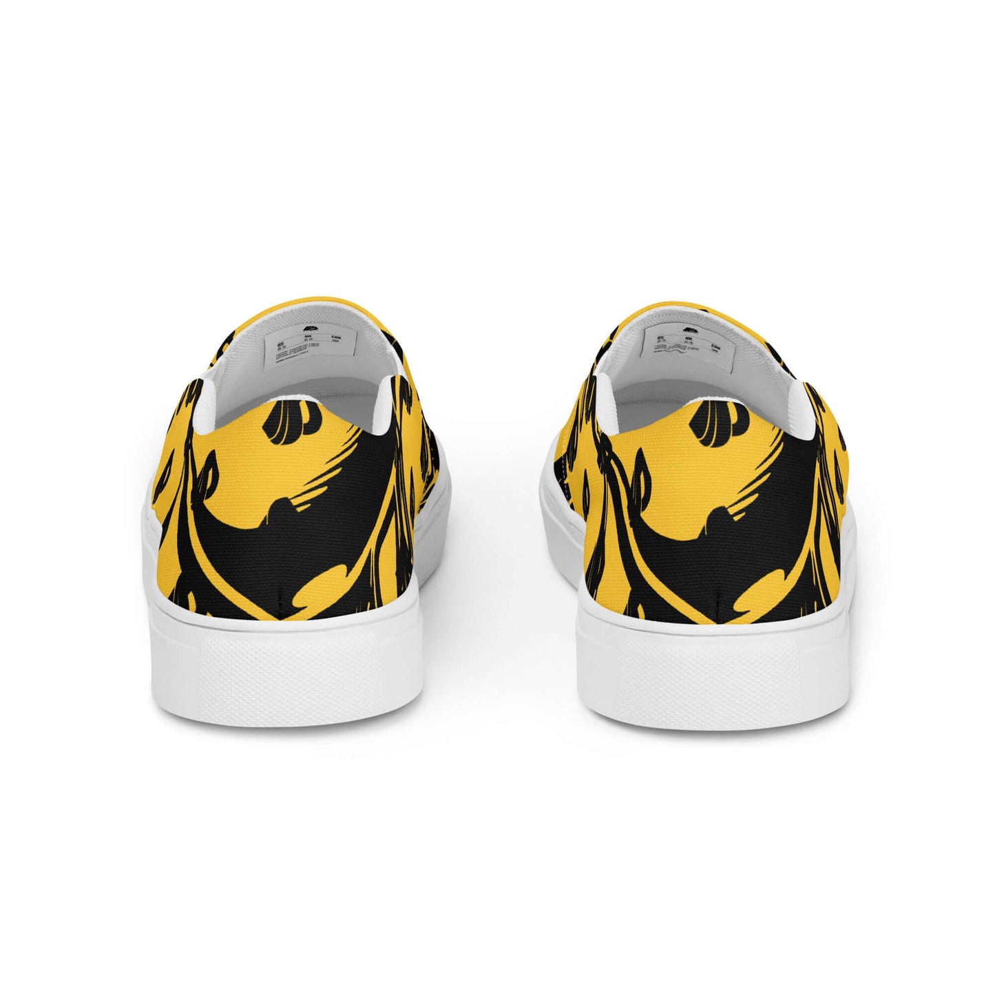 Yellow and black patterned Herren-Canvas-Slipper N°1 with flexible fit and EVA rubber soles, viewed from the back.