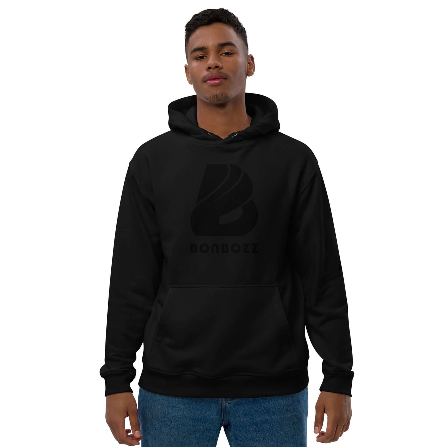 Man wearing Hochwertiger Öko Kapuzenpullover N°13 in black, featuring eco-friendly materials and front pocket.