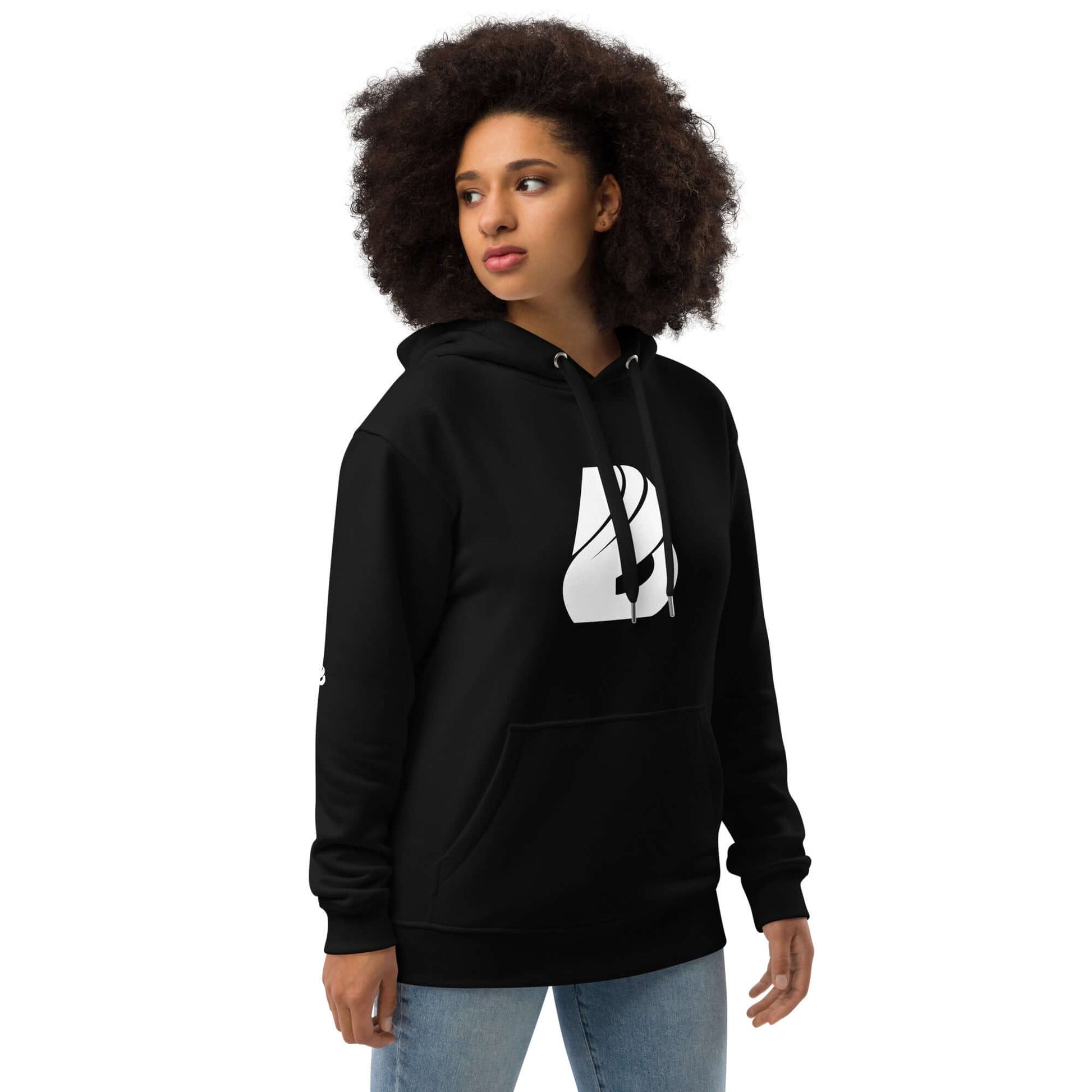 Person wearing black Hochwertiger Öko Kapuzenpullover N°14 with graphic print, made of organic and recycled materials, styled with jeans.