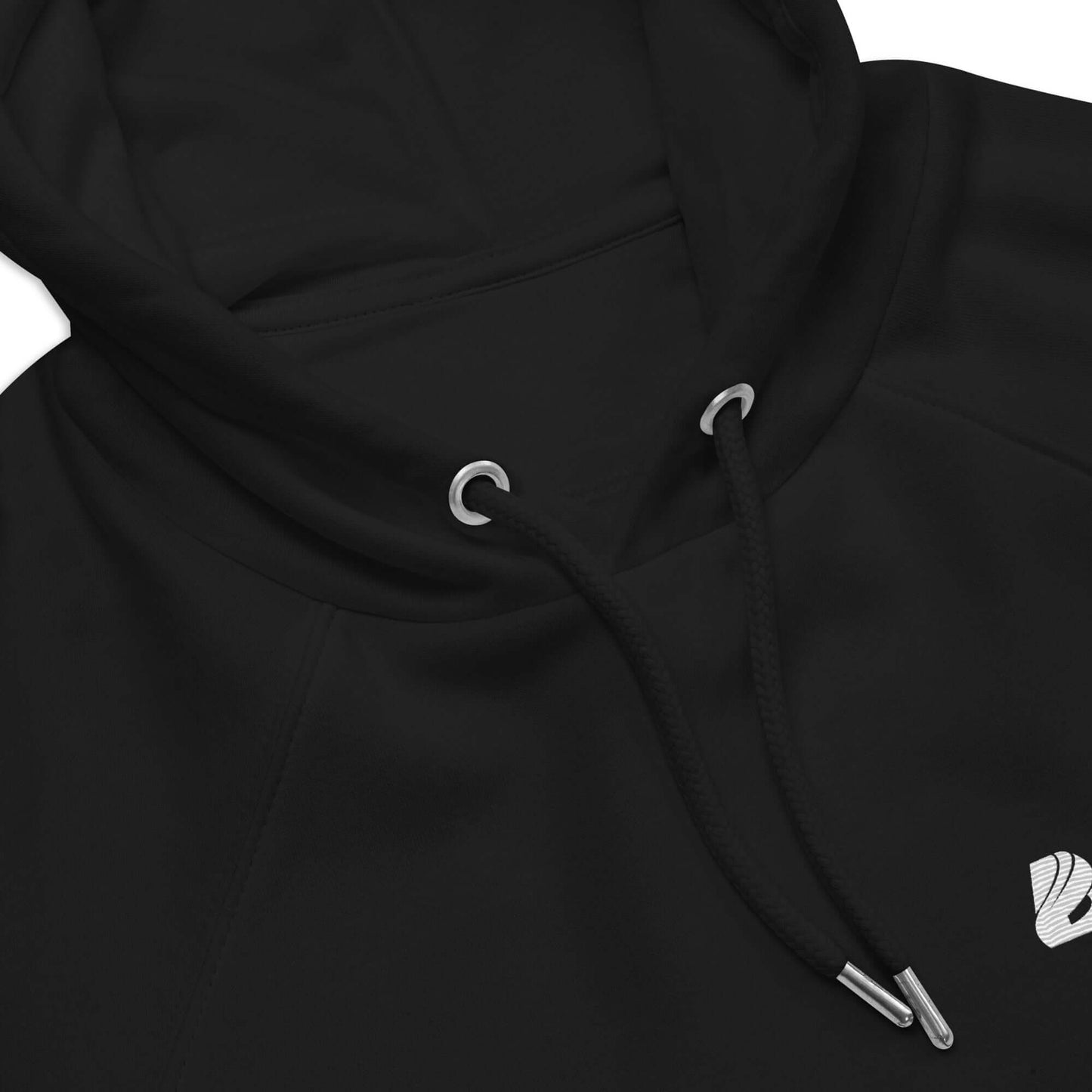Close-up of a black Unisex Bio-Raglan-Hoodie N°4 with drawstrings and logo on the chest, featuring a soft interior.
